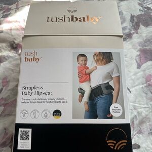 Tushbaby Black and gold strapless Baby Hipseat
